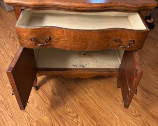 Antique Crest Line nightstand on castors.    32”w 18”d 30.5”t
$ 185.00