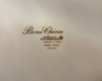 Mikasa “April Rose” Bone China, Japan 31 pcs., 1 serv platter, 1 cake plate, 
1 cake knife, 1 serv bowl, 2 trinket box, 
7 cups, 8 DP, 6 SP, 3 BP, 1 sugar.      $250.00
