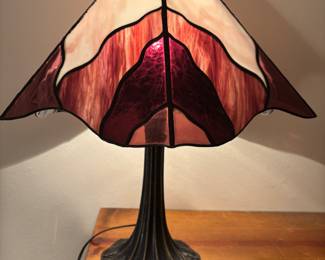 Stained glass lamp with metal base. 18.5”t 13.5”w 6.5” base.  $90.00