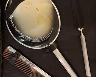 Women’s vanity case: mirror, brush,comb, perfume and makeup bottles.  $ 90.00