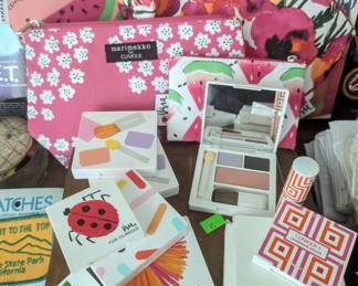 Clinique make up and make up bags, including some but Vera and Marimekko