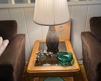 There are side tables here, too.  Or maybe you need a lamp.