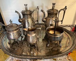 This silver serving set could use a good polishing, but would look fabulous when completed!