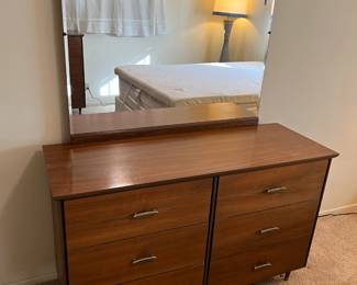 Here is a mirrored six-drawer dresser that needs a good home.