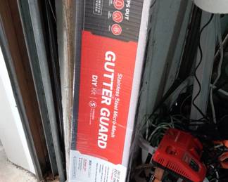 Box (opened) of Gutter Guard screens.
