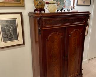 Barque carved mahogany gentleman’s armoire 