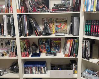 Gaming strategy books, comics, collectible figures, 
