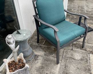Hampton Bay patio chair and sundial 