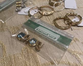 A nice selection of 18k and 14k earrings 