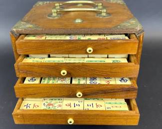 Mahjong tiles in oak case