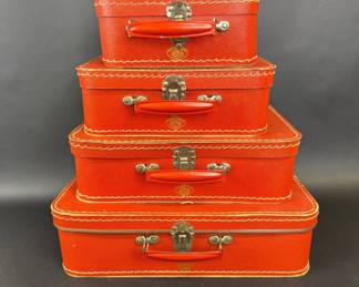 Vintage Kazeto Czechloslovakia set of four red cardboard nesting toy suitcases