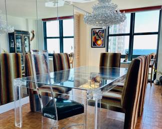 The table is sold. The chairs are available for purchase.