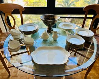 The footed bowl in the back center is sold.