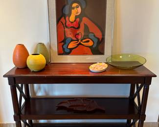 The painting and green bowl are sold.
