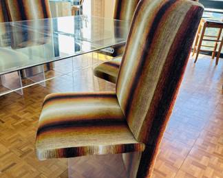 The table is sold. The chairs are available for purchase.