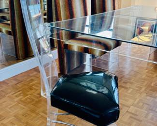 The table is sold. The chairs are available for purchase.