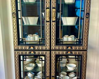 The Rosenthal chine sett is sold, but the display cabinet is still available for purchase.