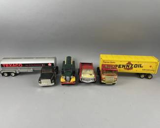Lot 292 | Texaco, Tonka & More Die Cast Metal Trucks

