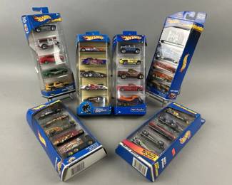 Lot 223 | Hot Wheels Gift Packs, Track Sets & More
