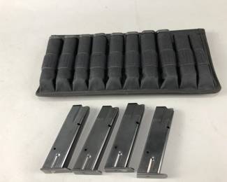 Lot 29 | Lock Perfection Magazine Case & More
