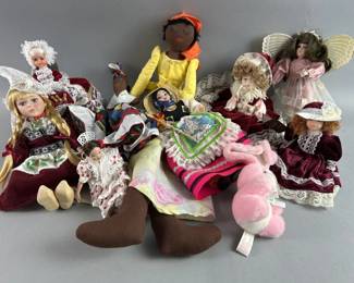 Lot 365 | Travel The World With Souvenir Dolls & More
