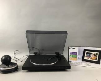 Lot 135 | Coby Digital Photo Frame & More
