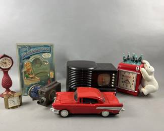 Lot 225 | Vintage Clocks, Filmco Camera & VHS Rewinder
