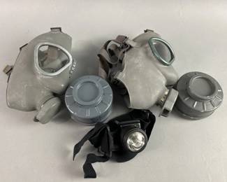 Lot 103 | Finnish Gas Masks, Canisters & Headlamp

