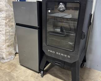 Mini Refrigerator and PitBoss Smoker Orlando Estate Auction