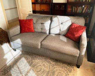 This is a new loveseat hide a bed