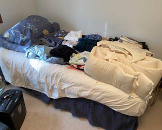 Twin bed frame and assorted linens