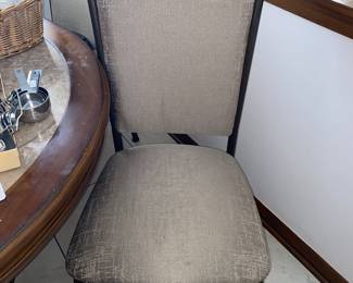 Close up of upholstered kitchen chairs