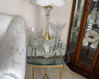1 of 2 glass top metal based end tables - glass decor