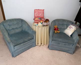 Pair of upholstered blue arm chairs