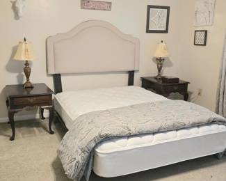 Contemporary headboard, nightstands, matching lamp pair, queen bedframe, queen mattress, linens, comforter, and eye-catching decor!  