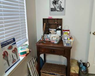 Antique sewing machine cabinet and sewing supplies