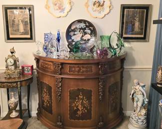 Ornate wooden bar with glass top