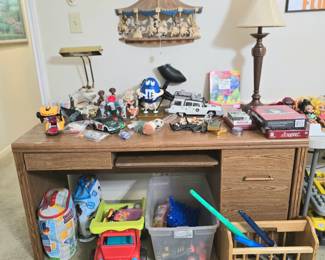 Ghostbuster-mobile!, vintage HomeCo (aka Home Interior) carousel wall art, Star Wars light sabers, and much much more! 