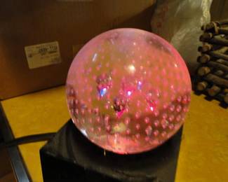 1950s Crystal Glass Sphere illuminated pink
