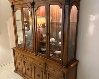 Thomasville wood china cabinet with light up display case. 74" l x 53" w x 20" d 