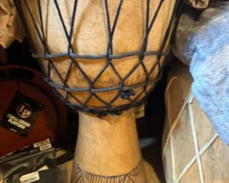 Carved wooden djembe drum