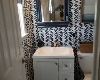 Petite bath vanity; mirror; vanity light