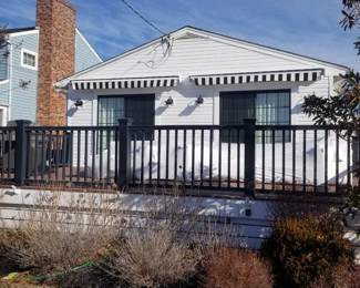 Sliding glass doors; awnings are SOLD