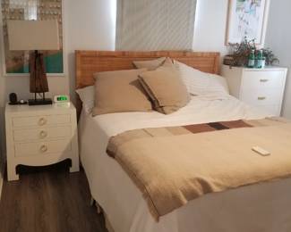 King bed is a platform bed with storage baskets; nightstands