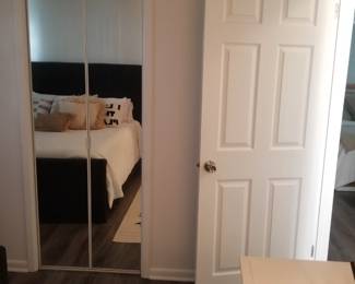 Mirrored closet door; updated 6-panel interior doors