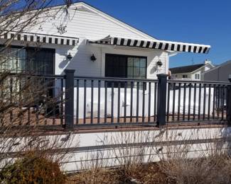 Two manual awning each approx. 11 ft. wide