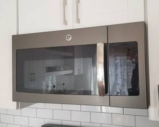 GE microwave oven mfg. 8/2015 - unit is 30" wide