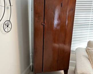 Antique cupboard/wardrobe with single drawer on bootjack base