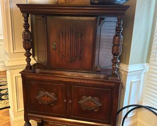 Jacobean style blind cabinet