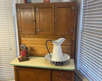 Antique Sellers Hoosier cabinet with flour bin, tambour roll up door and enameled pull out work surface